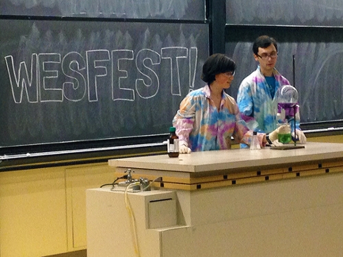 Jesse Mangiardi '15 and Mackenzie Schlosser '16 using a color-changing ammonia fountain to demonstrate gas laws and gas solubility