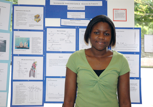 2010 Noreen Nkosana, '11 with her poster.