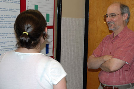 Prof. John Seamon Talking with a Student