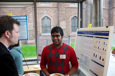 Raghu Appasani presents his study, "The Impact of a Social Skills Training Program on Patients with Schizophrenia," to his advisor Prof. Matthew Kurtz