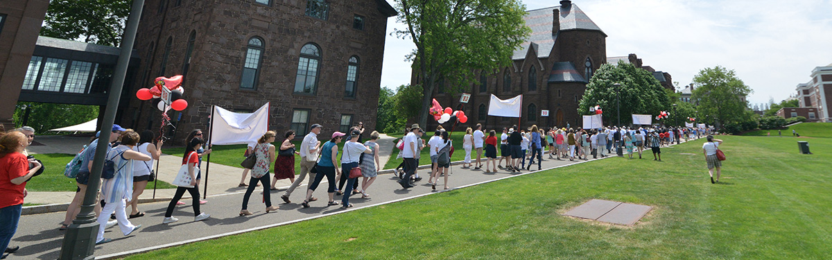 Alumni parade before the annual assembly