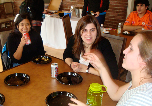 Students engage in an active peer-advising luncheon on selection of labs and classes.