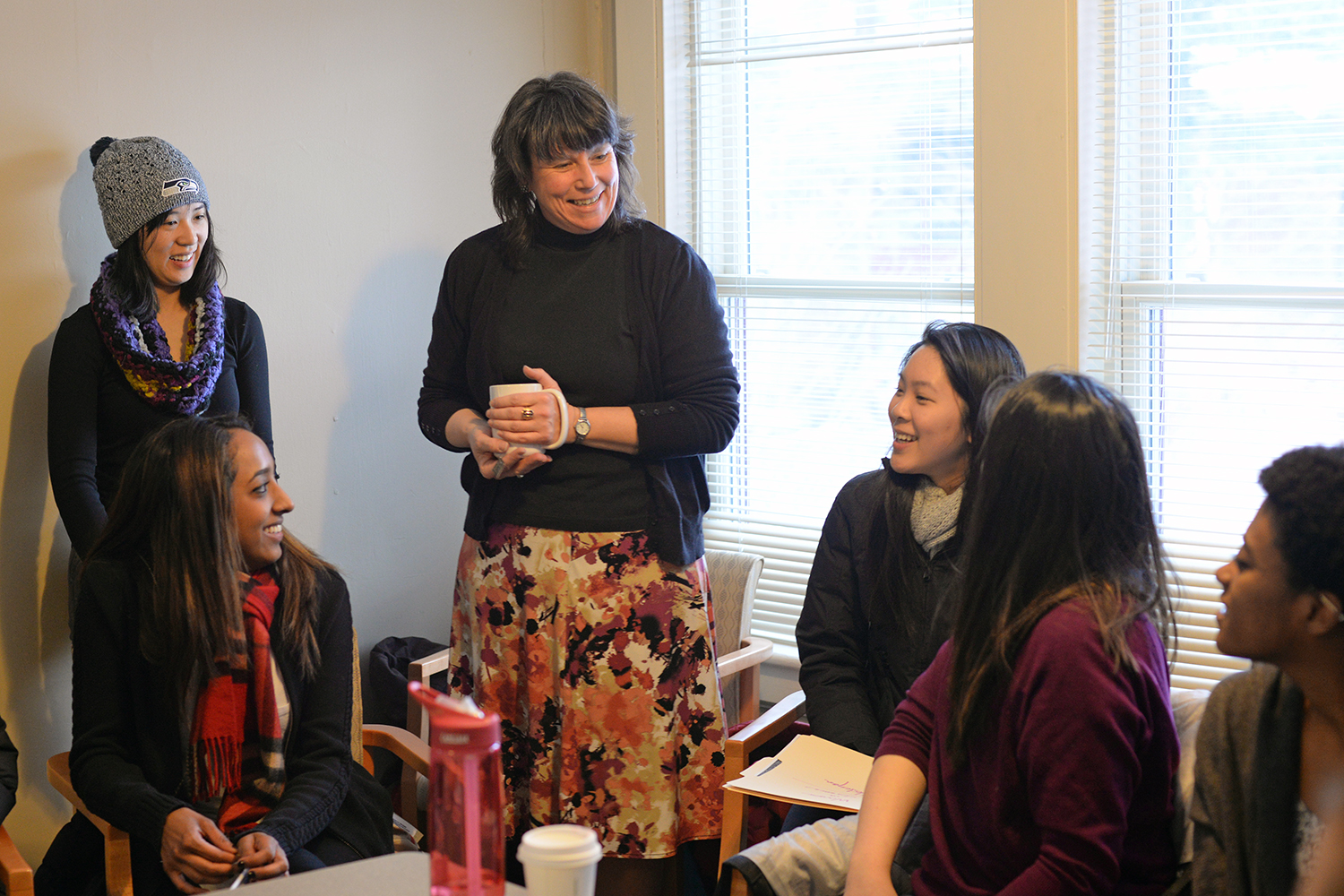 Associate Professor of Computer Science Janet Burge chats with the group.